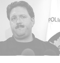 epa00605941 Guatemala's National Civil Police (PNC) Director, Erwin Sperisen talks to journalists, Monday, 02 January 2006, during a press conference in Guatemala City about the theft in the storehouses of the Analysis and Antinarcotic Investigation Section (SAIA). Early on Saturday, a dozen of armed persons attacked the storehouses to  steal 475 kilograms of cocaine.  EPA/LUIS ECHEVERRIA