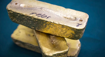 Gold alloy bars are seen at Altyntau gold mine extraction factory outside northern Kazakhstan's town of Kokshetau June 13, 2013. The gold industry has released new guidelines for bullion miners under pressure to disclose the real economics of producing an ounce of metal, feeding a debate over the sustainability of many gold mines in a sector battered by falling prices. Picture taken June 13, 2013.  REUTERS/Andrey Lunin  (KAZAKHSTAN - Tags: BUSINESS COMMODITIES) - RTX113LE