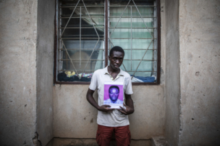 18-year-old Mansa Emmanuel, son of Kawdwo Nsiah. Kawdwo was one of 44 Ghanaians who was massacred with 12 other west Africans in The Gambia in 2005. ©Jason Florio / TRIAL International