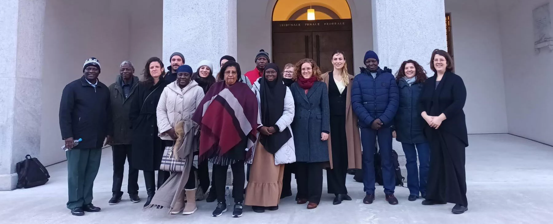 Plaintiffs, plaintiffs’ lawyers and representatives of TRIAL International before the FCC in Bellinzona during the second week of the trial of Ousman Sonko in Switzerland.